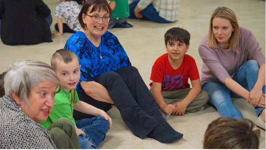 The Gramma Drama works on a story together.